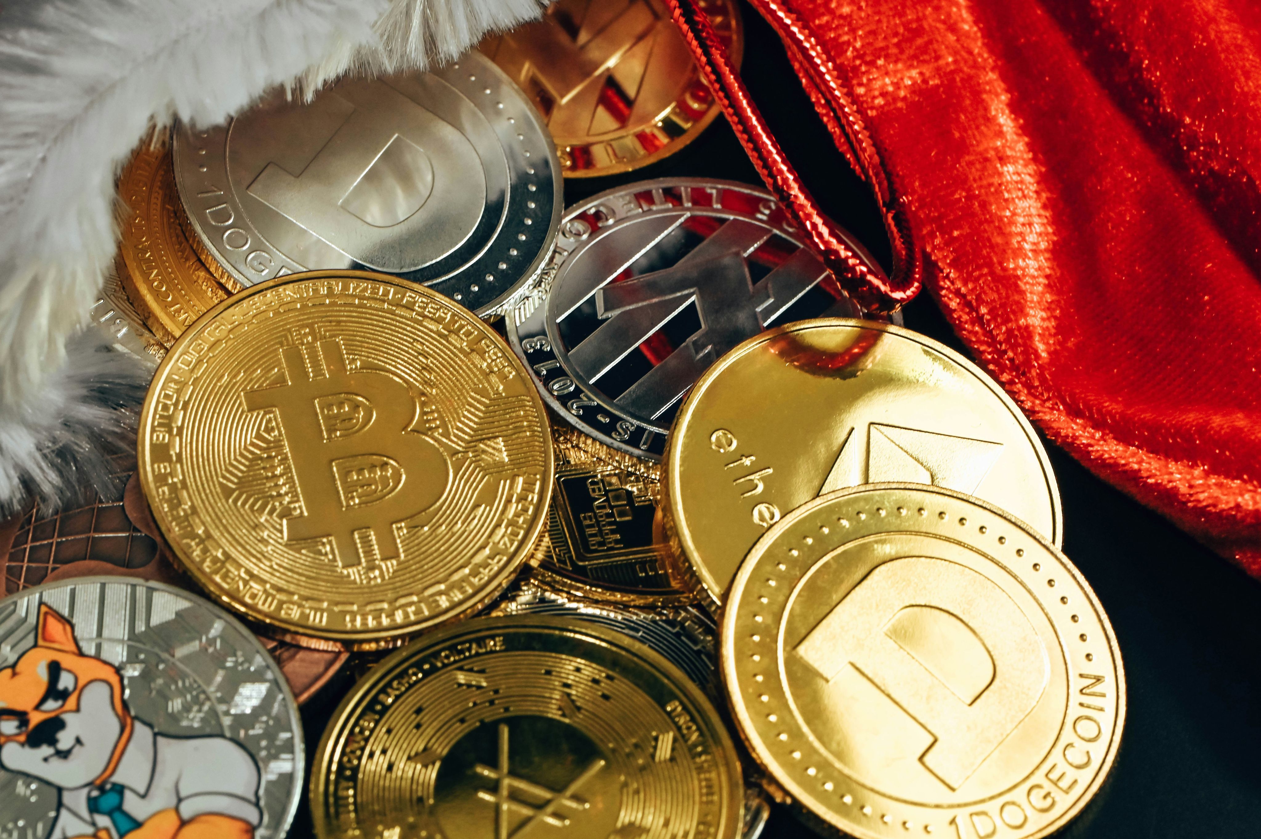 a pile of bitcoins sitting on top of a table